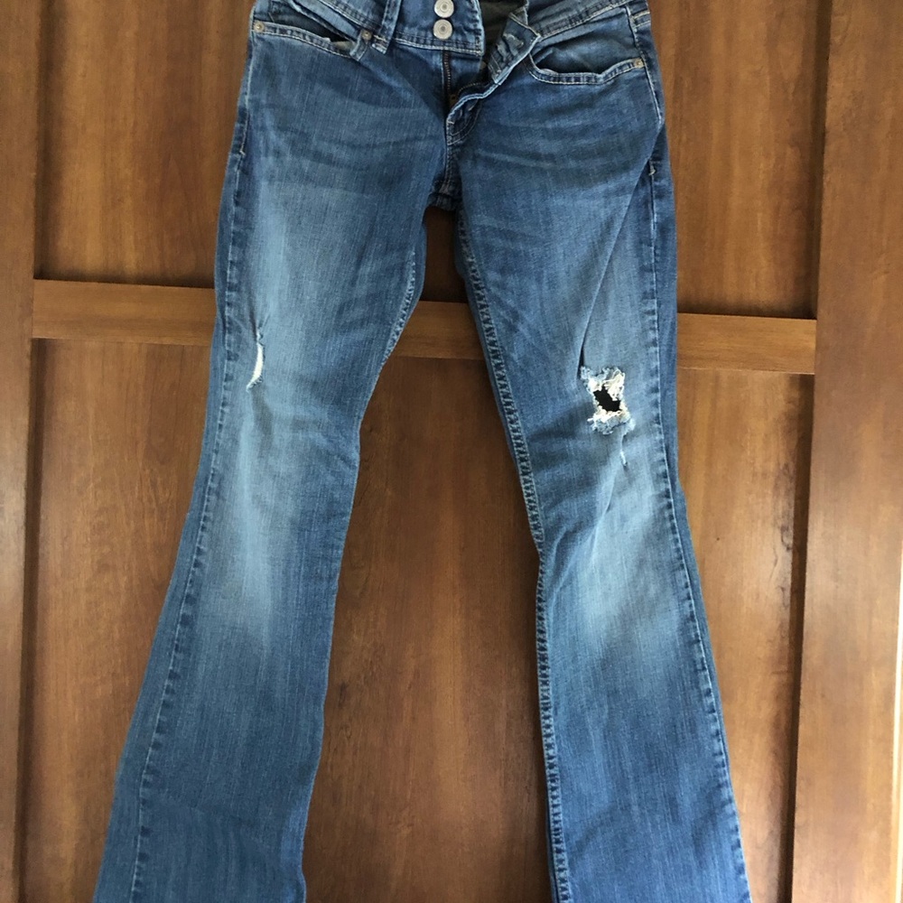 Levi's Blue Boot Cut Jeans with Distressed Detail